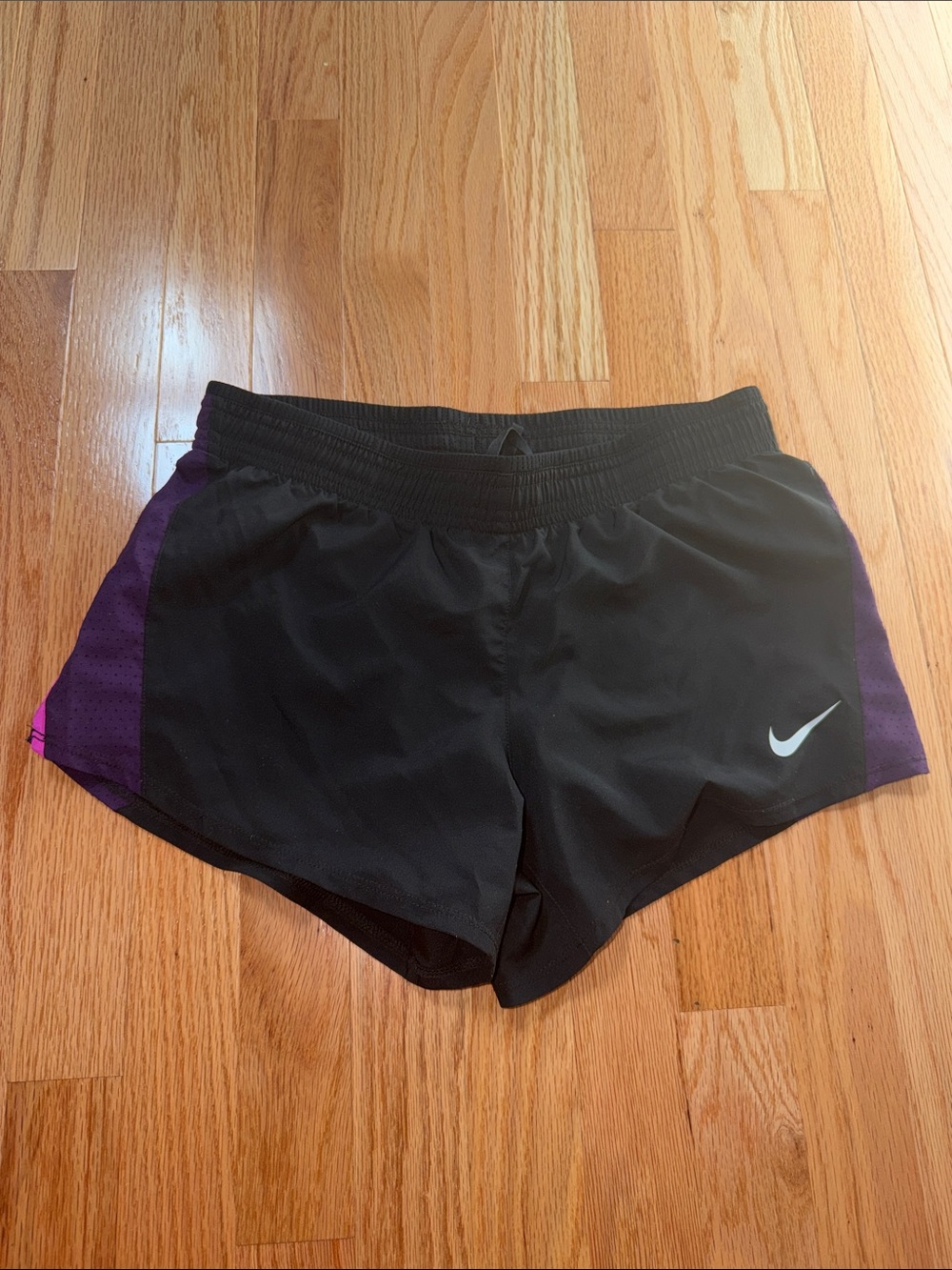 Nike Women's Black Athletic Shorts with Purple Side Panels